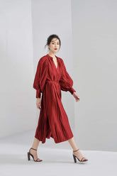 Pleated silk midi dress with long puff sleeves and V-neck wrap silhouette